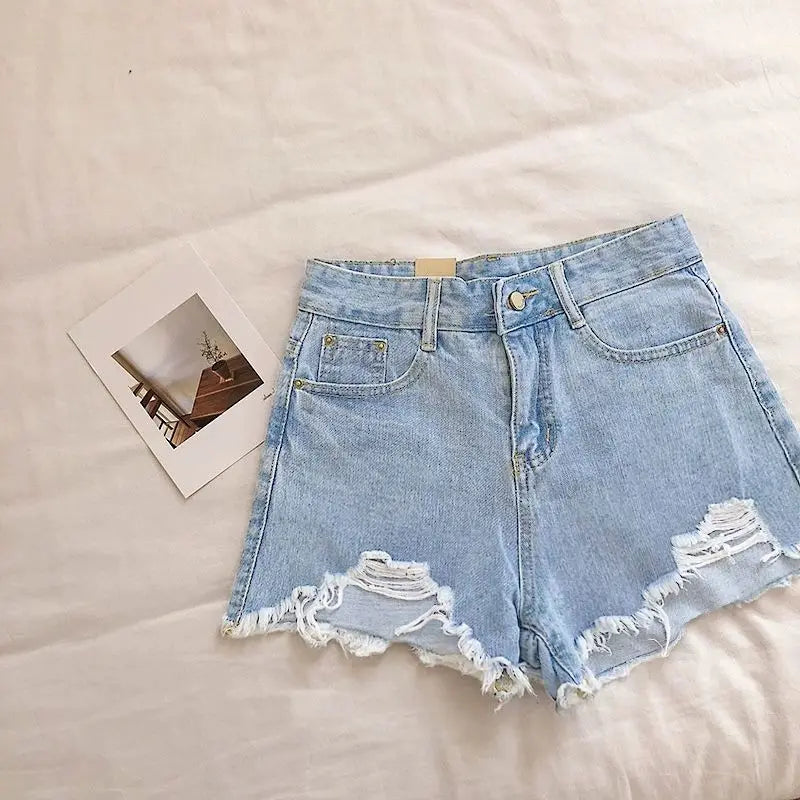 Women High Waist Ripped Denim Shorts for Spring and Summer.